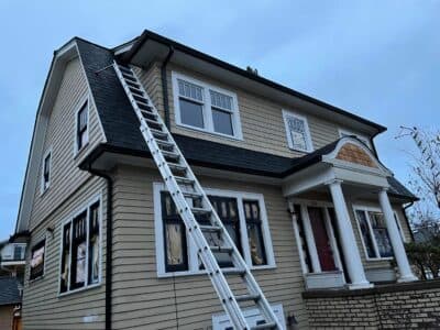 King Roof Care team working on a Seattle home